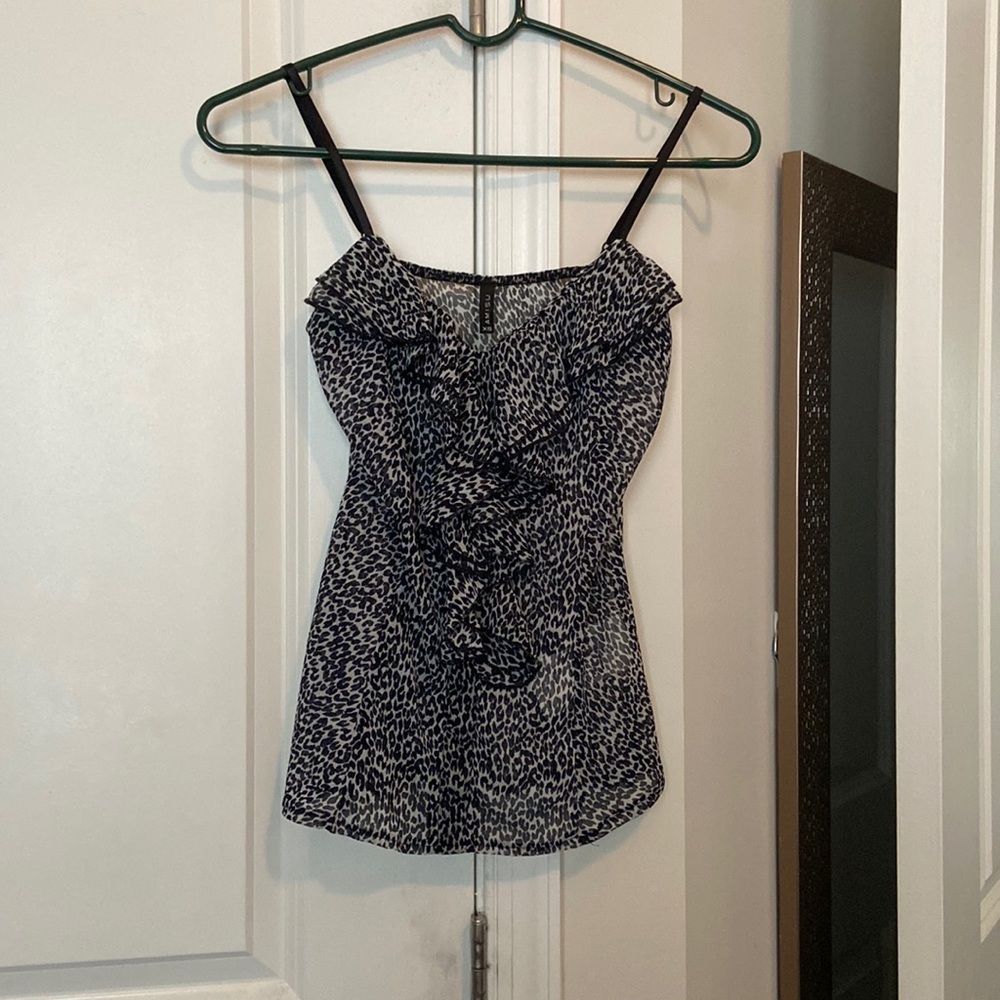 Black and white animal print blouse by amisu.